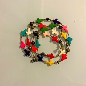 Bracelet with colourful little crosses.
